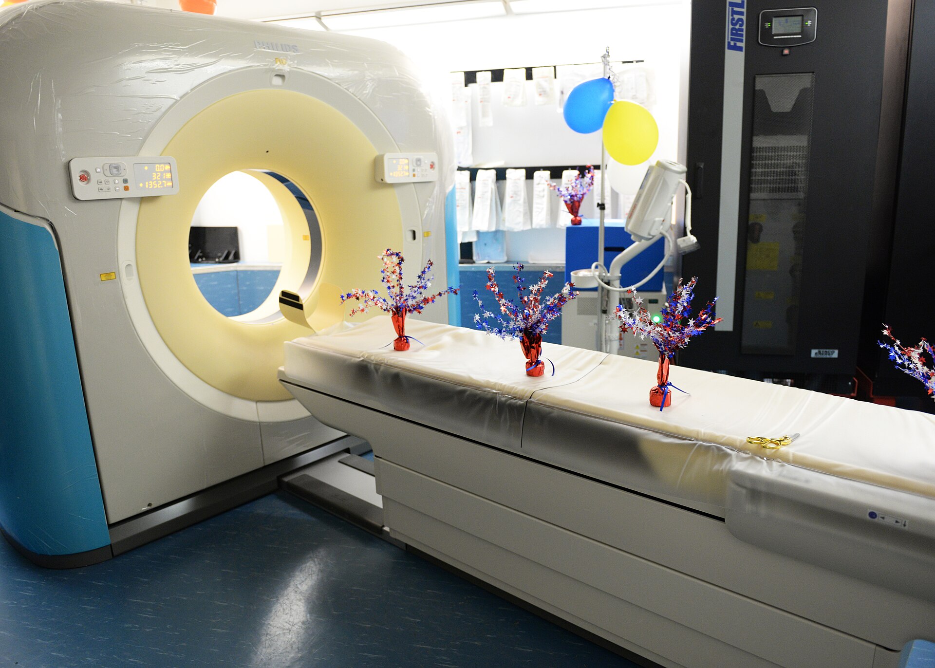 Hospital staff installing a CT scanner